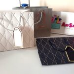 Funda pequeña regalo horizontal c/líneas doradas 17.7x10x23 cm