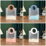 Bolsa PVC con agarradera 23 x 26 cms