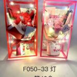 Caja de flores articificiales con luces