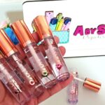 Lip oil con flor