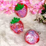 Set de ligas con estuche transparente Frutilla